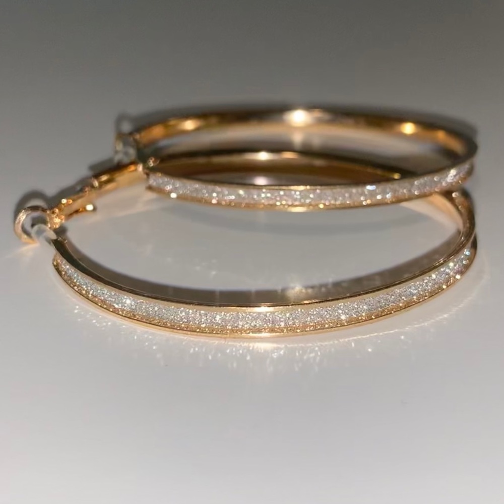 2 Gold Hoop Earrings